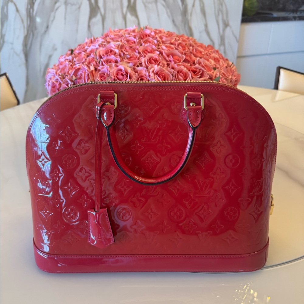 Louis Vuitton rare raspberry Patent Alma monogram